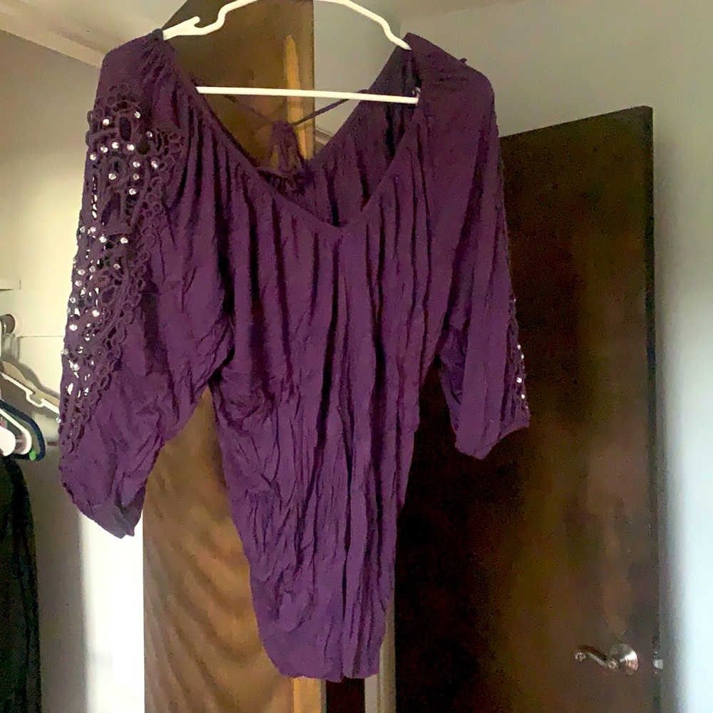 Purple INC shirt